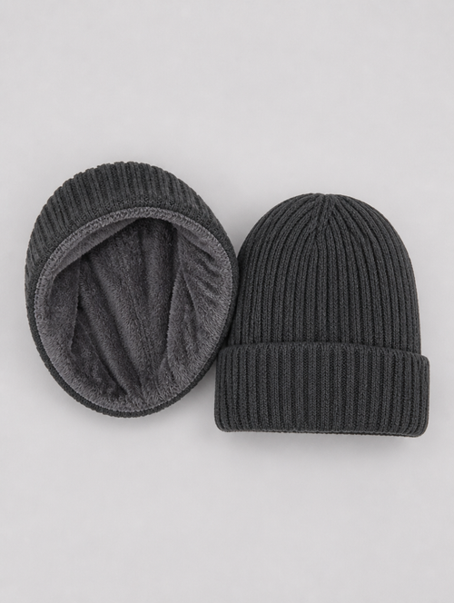 Knit beanie turned inside out to show the fleece lining